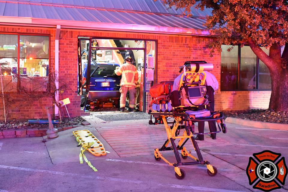 CAR SMASHES INTO HALL GROCERY ONE FEMALE IN CRITICAL CONDITION